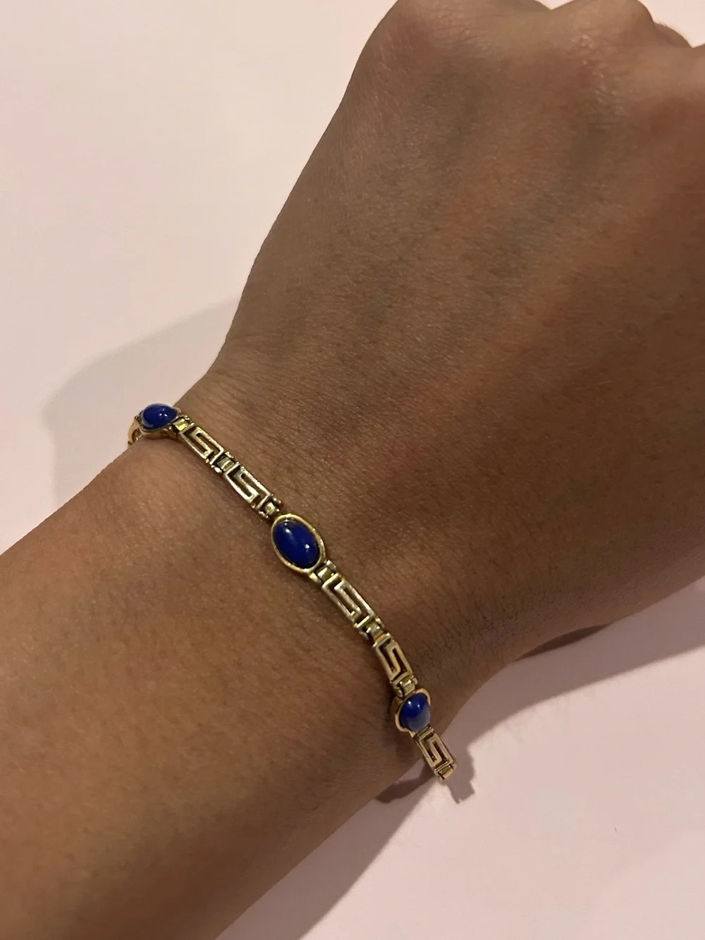 Gold Bracelet with Blue Stone Accents